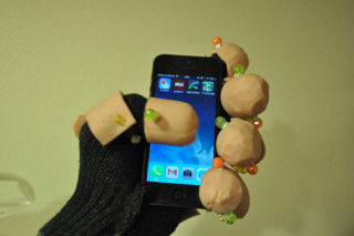 Illustration for article titled Sausage Gloves Are Useful and Delicious